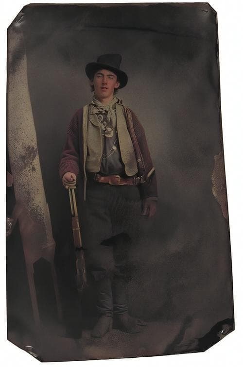 Colorized: A young man with a rifle, photographed on a tintype around 1880
